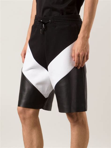 givenchy signature shorts|Givenchy track pants.